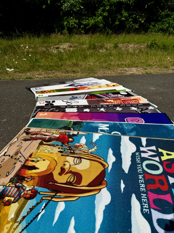 Rugs – fan spread (Astroworld front) Fan spread of rugs with Astroworld in the foreground, followed by good kid, m.A.A.d city, Graduation and the new drop